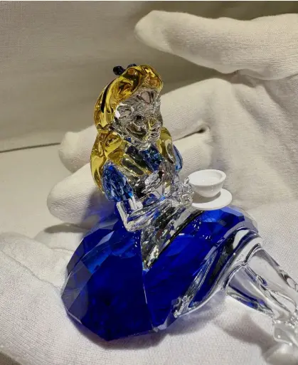 Alice in Wonderland crystal rabbit and teapot collectibles with gold accents