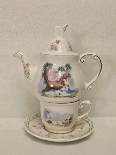 Alice in Wonderland art tea set in blue and gold porcelain