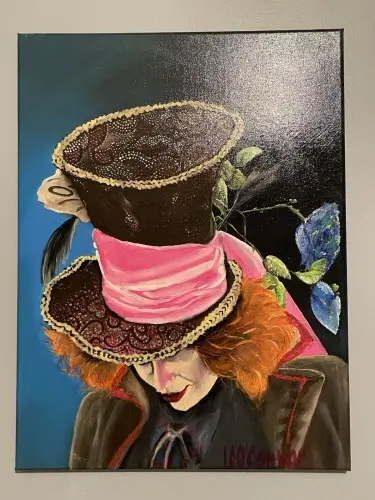 Wonderland art painting of Alice and friends in a framed gold frame